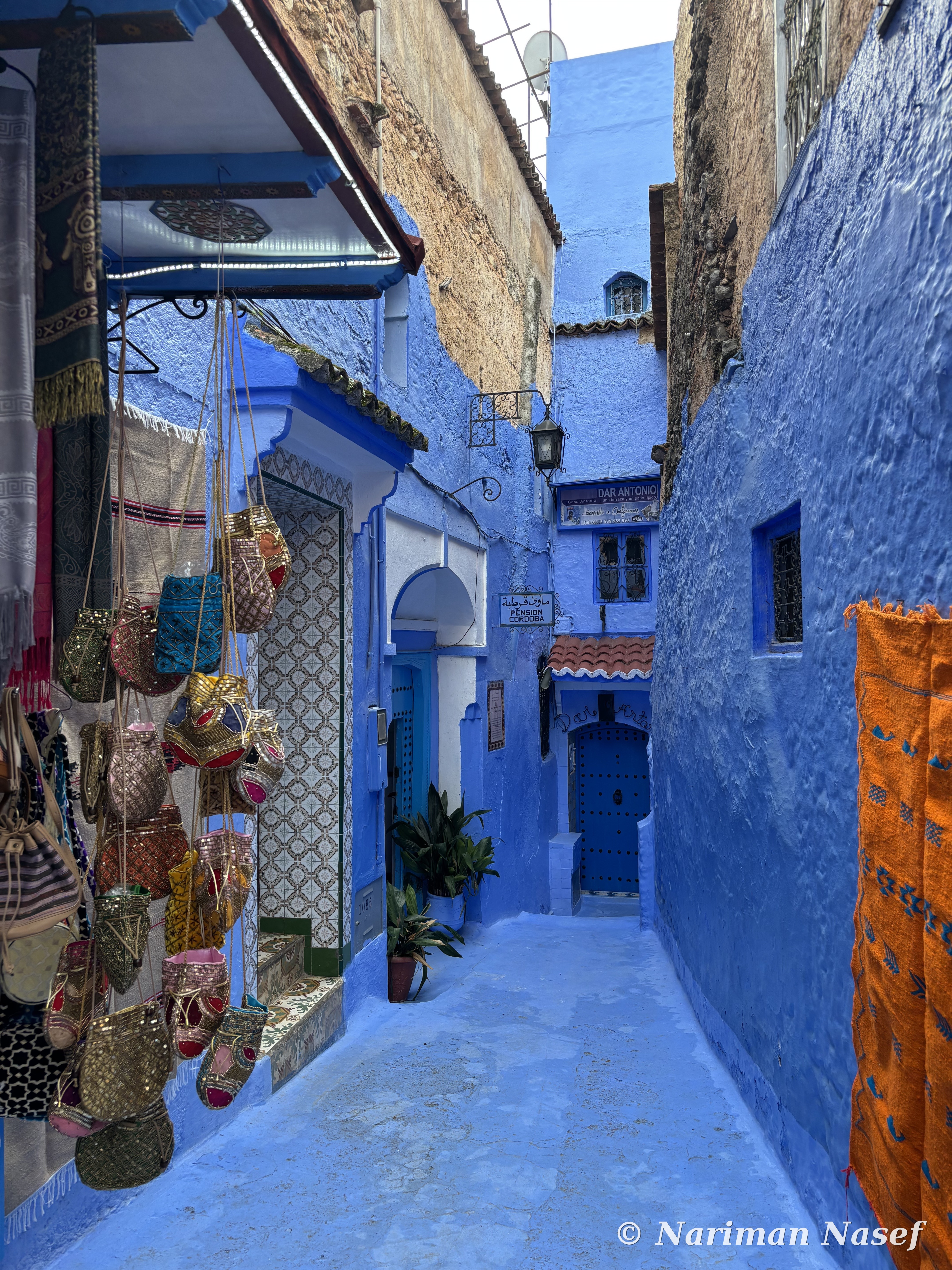 Blue-painted alley in Chefchaouen, Morocco
