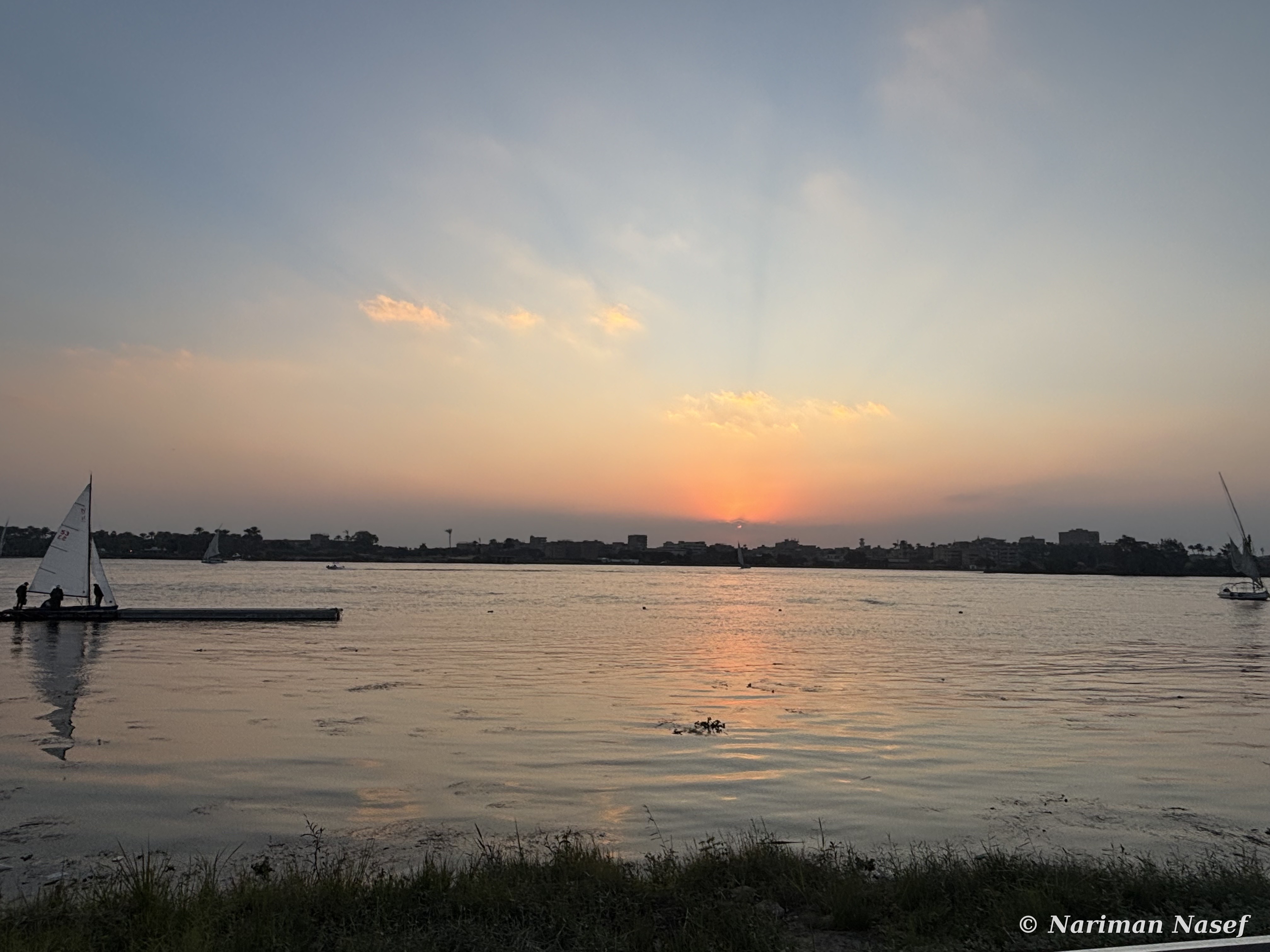 Sunset over the Nile with feluccas