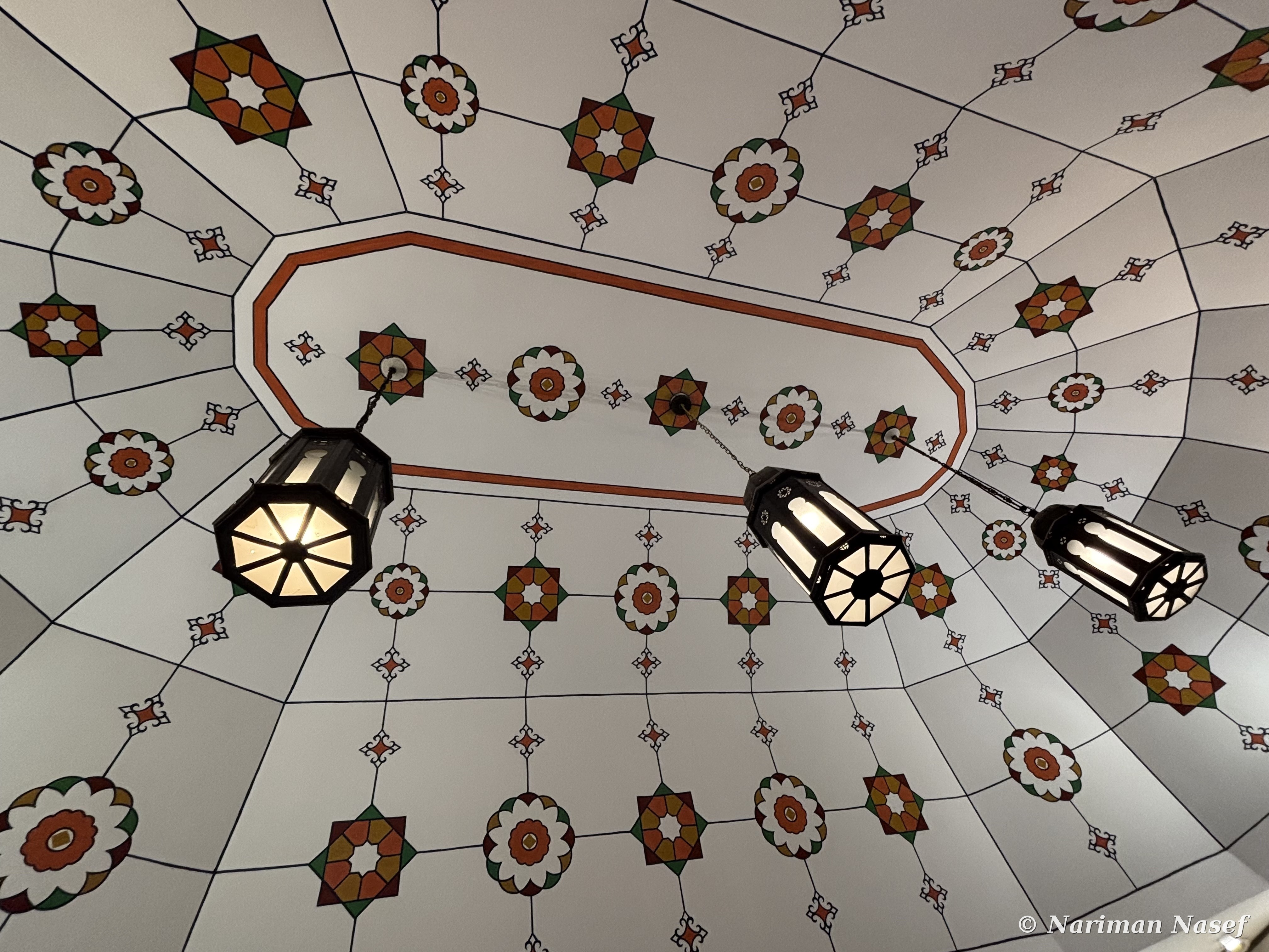 Painted ceiling and hanging lanterns